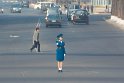 Das erste Ampelmädel. Aus dem Reiseführer und vom Deckblatt der Nordkorea Karte bekannt, eine Verkehrspolizistin, wie sie an fast allen Kreuzungen anzutreffen sind.